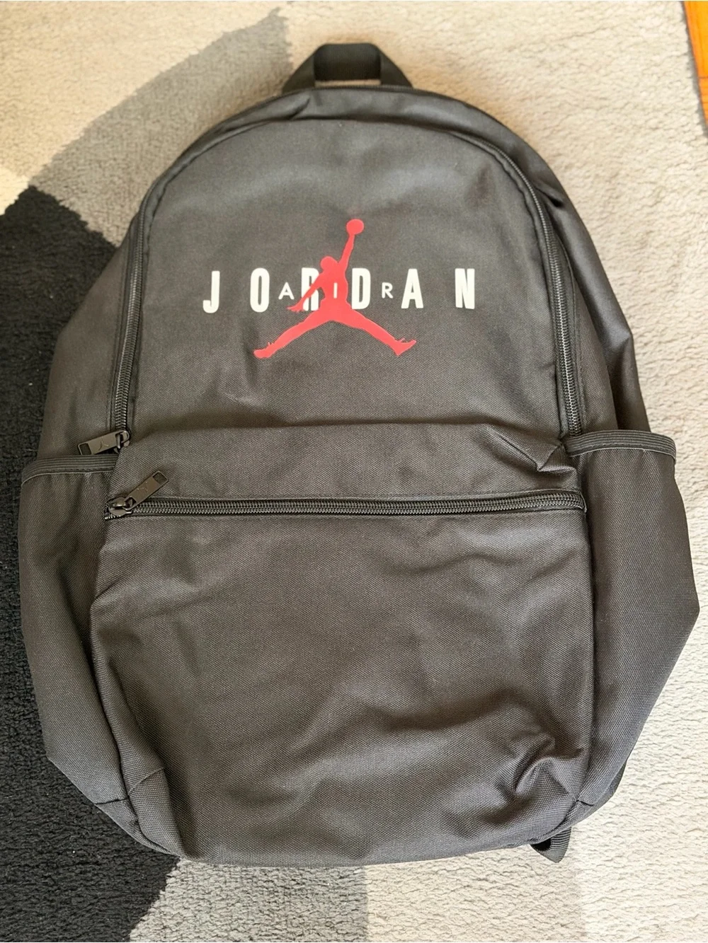 Jordan Black Backpack with Red Jumpman and White Lettering